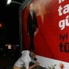 reklam panosundaki rte nin ayağını öpen akpli / #537881